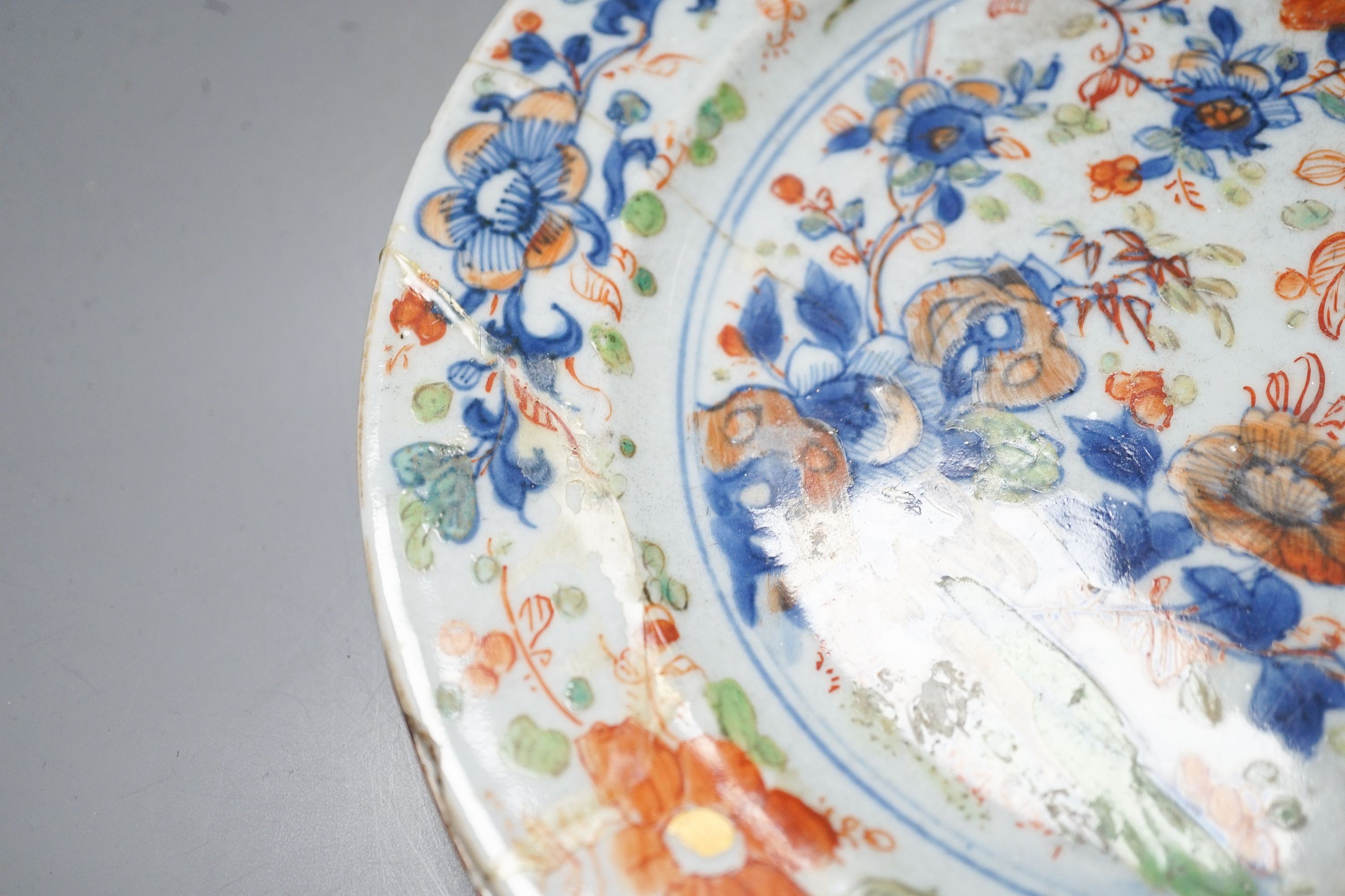 An 18th century Chinese blue and white jar, three 18th century clobbered Chinese plates and a pair of Satsuma vases